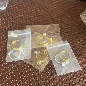 Gold and Silver Rings with Clear Stones